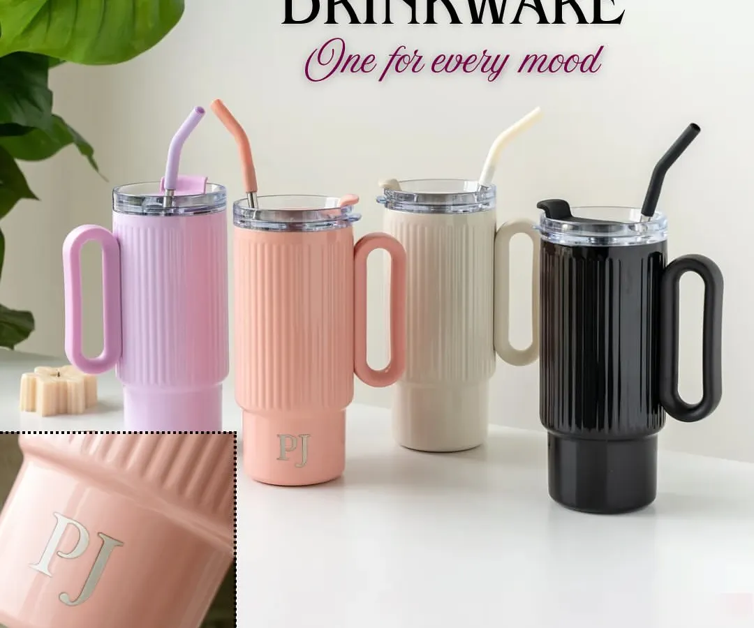 Meet your new favorite hydration accessory. These ribbed tumblers come with a handle and straw, and we can personalize them with initials. They are available in a variety of pastel shades and classic black, perfect for corporate gifting or personal use.