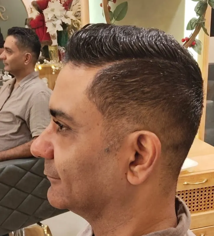 The final result of a precision haircut. I focus on the details, whether you want a modern fade or a timeless classic style, to create a look that is sharp, clean, and tailored to you.