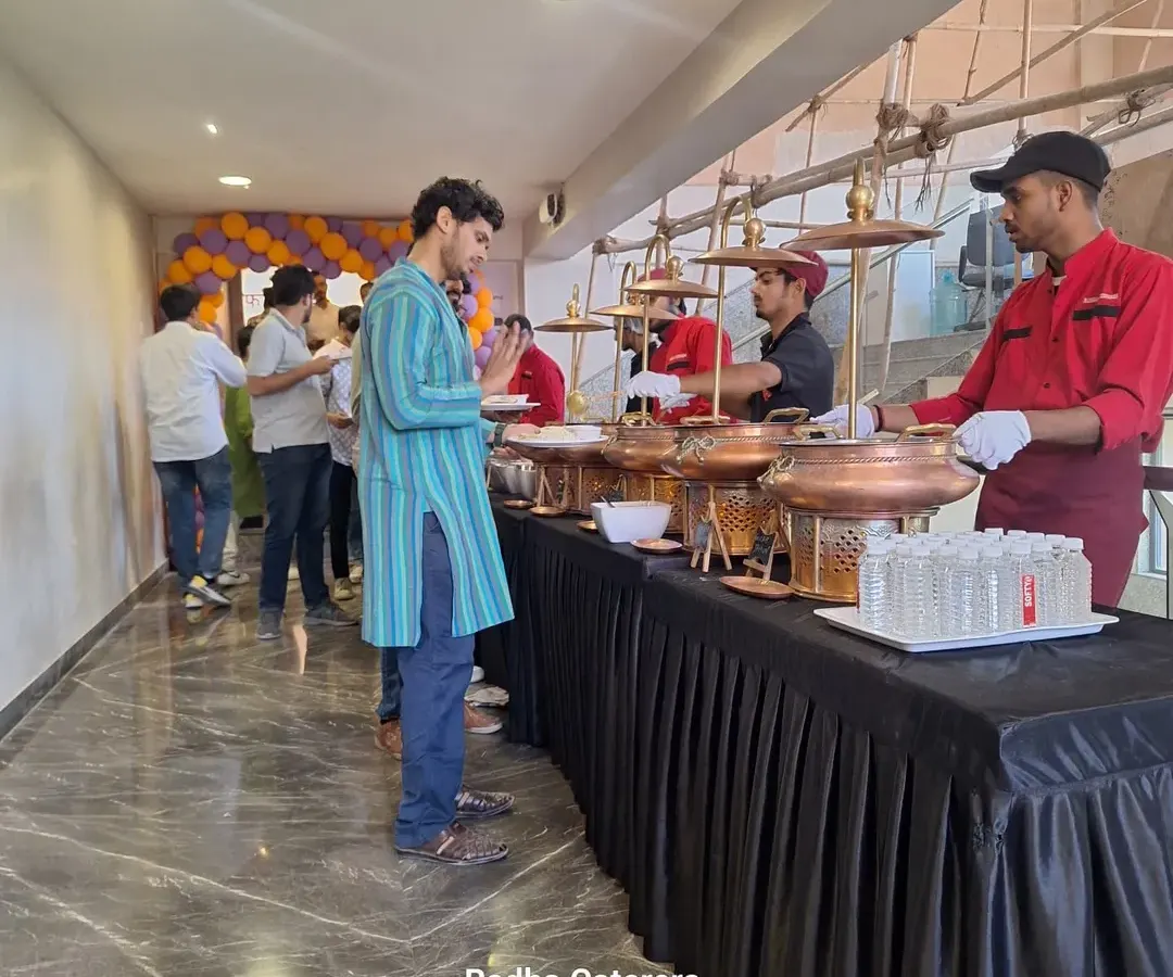 Here is my team in action at a corporate launch. We ensure the buffet line moves smoothly and every guest is attended to. Our uniformed staff are trained to be professional and helpful, so you can focus on your event without worrying about the food service.