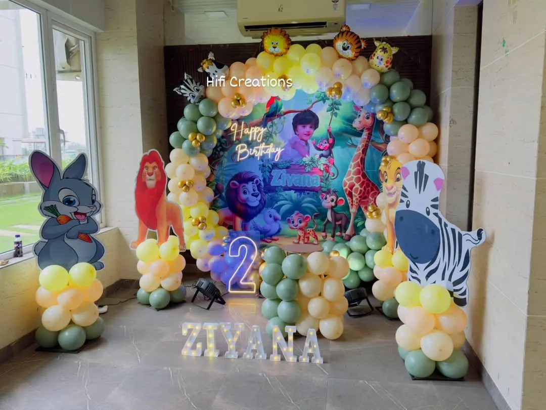 We bring the jungle to you with our popular Jungle Safari theme. This setup for a second birthday features a vibrant backdrop, themed balloon arch, light-up numbers, and life-sized cutouts of favorite jungle animals like lions, zebras, and monkeys.