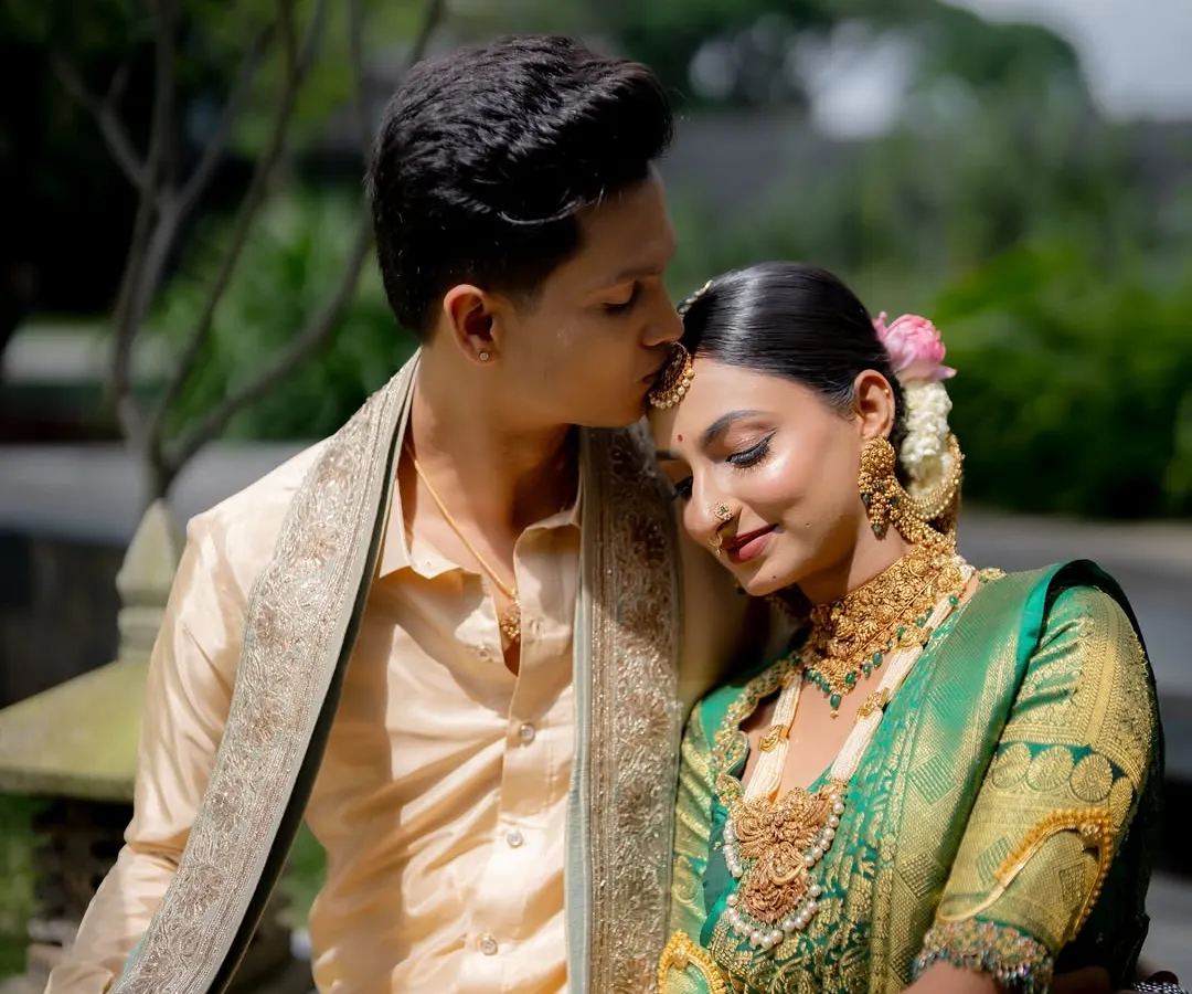 Creating a cohesive look for the couple is essential. Here, the bride's traditional elegance is perfectly matched by the groom's subtle, clean makeup, ensuring they both look their absolute best for their wedding portraits.