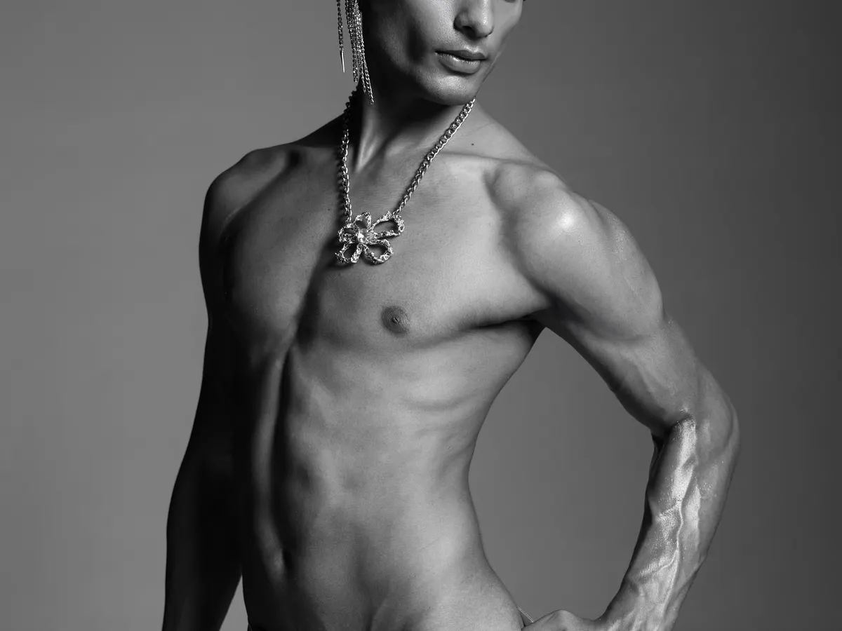 A black and white shot from a Calvin Klein campaign I directed. The goal was to capture a raw, powerful image that highlights both the model's physique and the brand's iconic underwear. This type of high-contrast, minimalist photography is a signature of my menswear work.