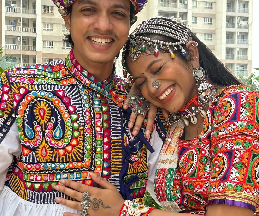 Grab your partner and get ready to dance! I love helping couples find coordinated outfits. This is a great example, showing how traditional embroidery and vibrant colors can create a stunning matching look for Navratri.