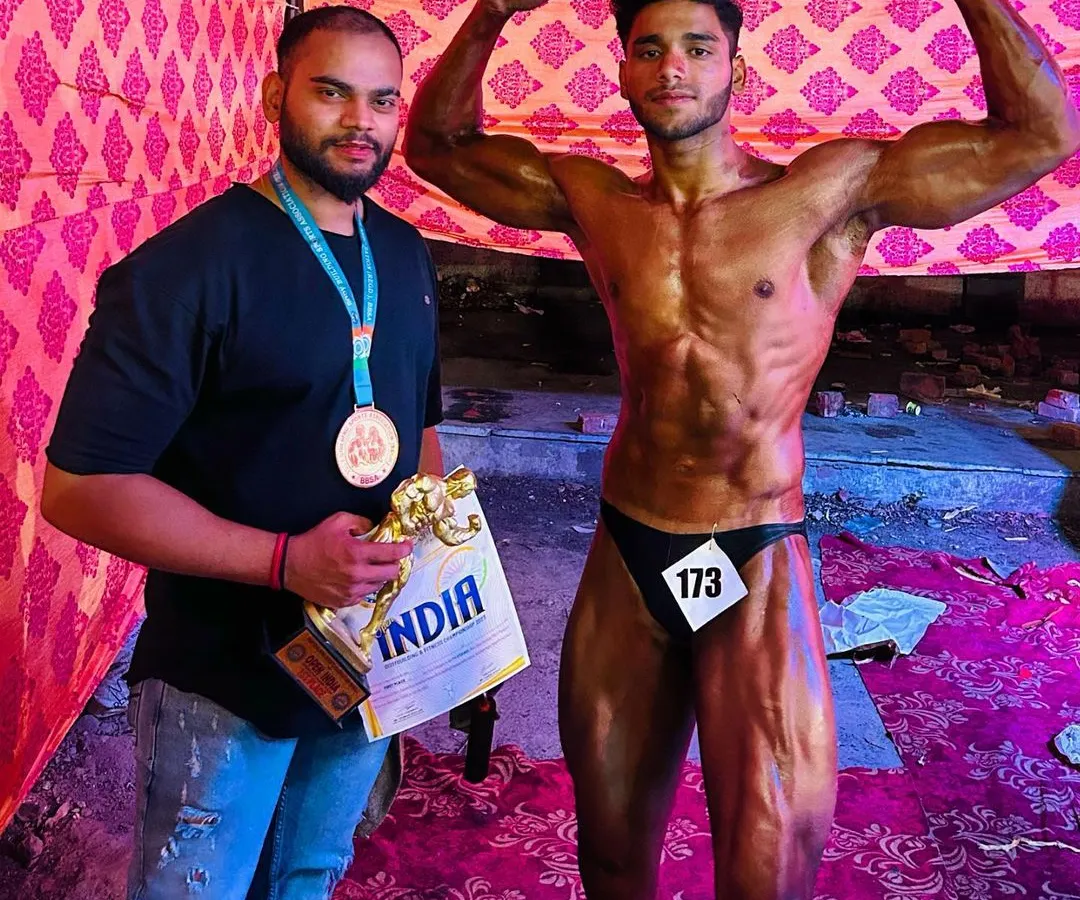 Here I am with one of my students after his win. His victory is my victory. We worked together with a strict natural bodybuilding prep plan to get him into this winning condition.