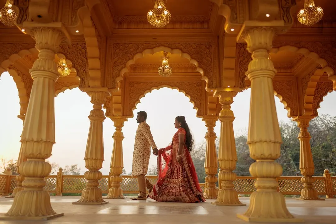In the grandeur of a palace corridor, this couple shares a quiet moment. I use architectural elements and natural light to create regal, elegant couple portraits that feel both grand and personal.
