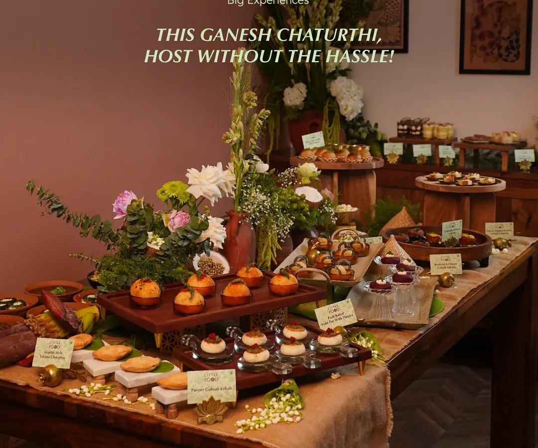 This is how we do festive celebrations. We design stunning, full-spread tablescapes with bespoke menus, like this no onion, no garlic spread for a Ganesh Chaturthi gathering, so you can host without the hassle and enjoy the party.
