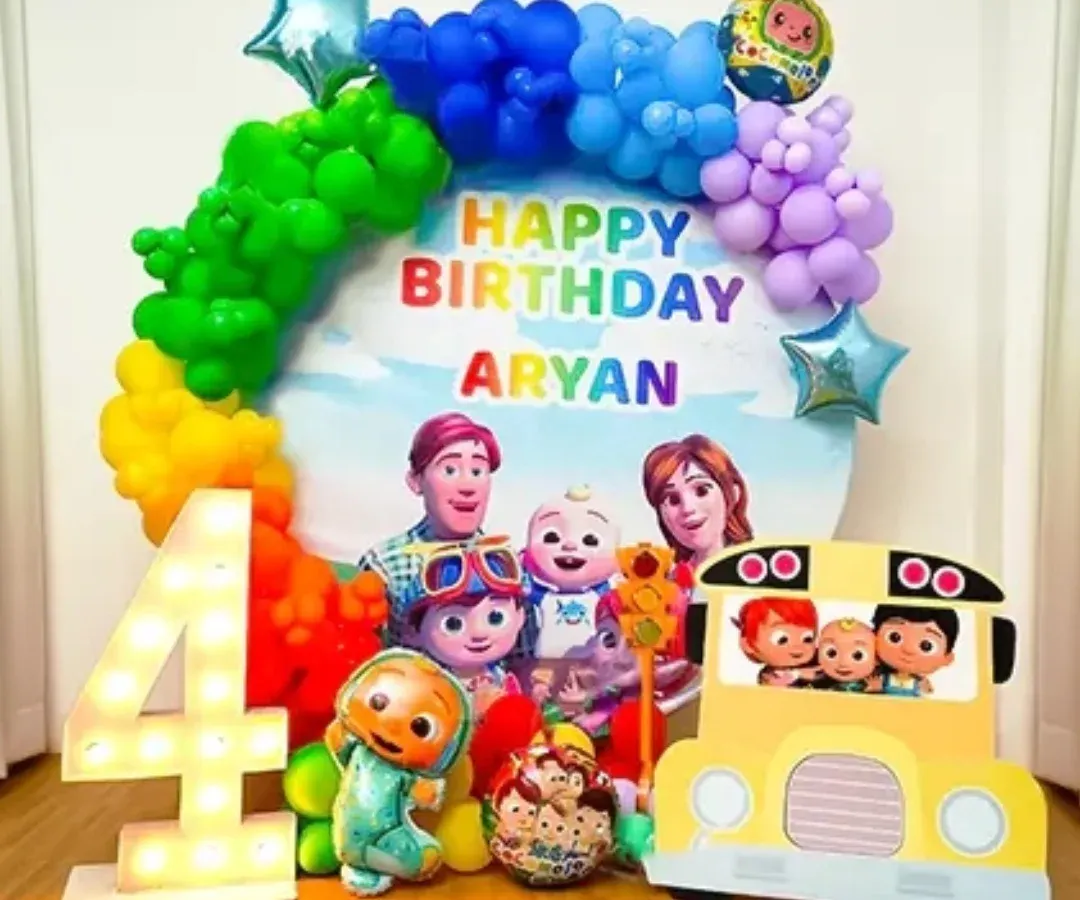 For the little ones, I bring their favorite characters to life. This Cocomelon themed birthday setup features a custom backdrop, a vibrant rainbow balloon arch, character cutouts, and a large light-up marquee number to make the birthday boy or girl feel extra special.