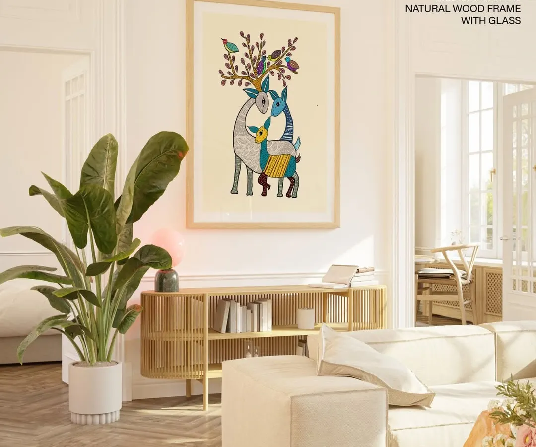Celebrate the rich heritage of Indian tribal art with this stunning Gond painting of a deer family. Displayed here as a large 48x64 inch canvas print in a natural wood frame, its intricate patterns and vibrant colors make a powerful cultural statement in a modern home.
