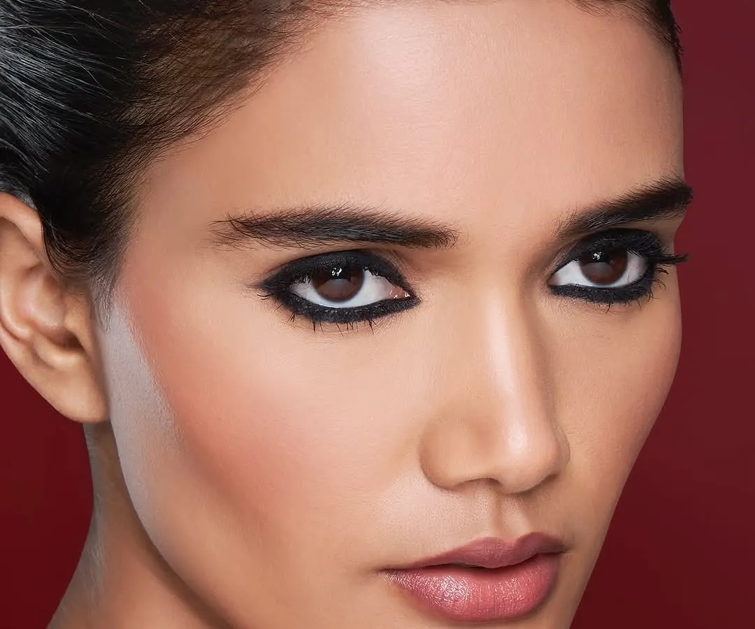 This close-up for the Lovechild by Masaba beauty campaign highlights my precision with dramatic eye makeup. The graphic, reverse winged eyeliner is sharp and symmetrical, designed to make the product the hero of the shot.