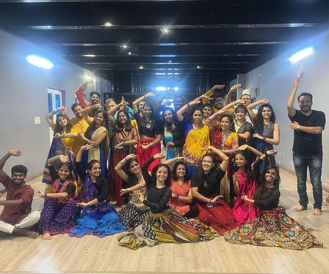 The studio comes alive with color and energy during workshops. This photo from a recent Garba session shows how the space comfortably accommodates large groups, making it an ideal venue for instructors to host classes and events.