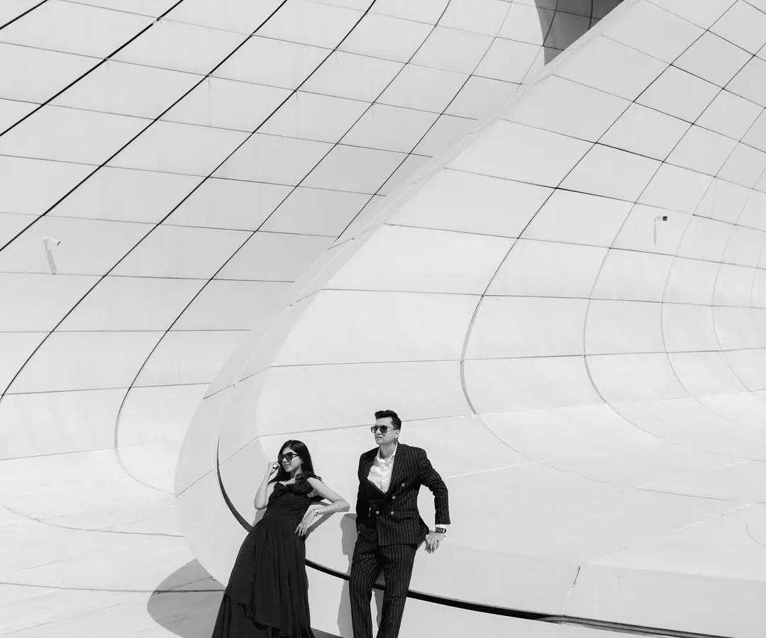 A moment of quiet grandeur in Baku, Azerbaijan. I love using dramatic architecture and monochrome tones to create timeless, high-fashion portraits that feel like a still from a classic film. This shows how a destination pre-wedding shoot can be both epic and deeply personal.