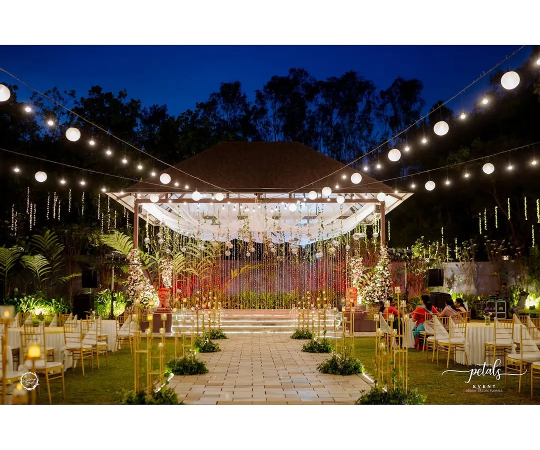 For this sangeet, I transformed an outdoor space into an enchanted wonderland under the stars. A canopy of string lights and suspended disco balls created a magical atmosphere for a night of dancing and celebration.