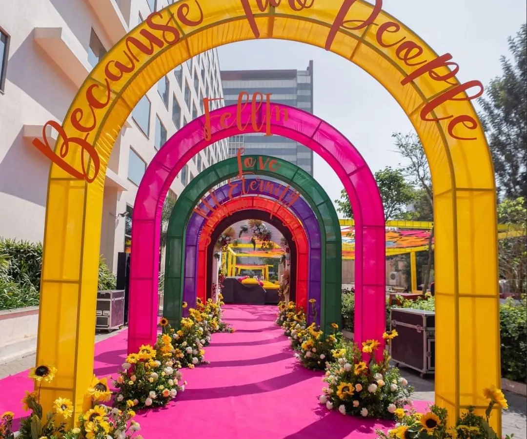 To make a fun and unforgettable first impression, we designed this vibrant rainbow archway for a Mehandi entrance. The bright pink carpet and sunflower accents guide guests into a celebration filled with color and energy.