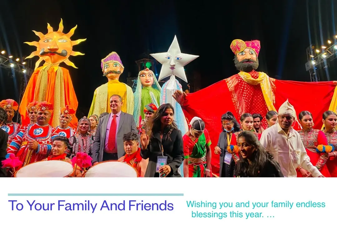Here you can see some of our giant parade puppets on stage with our full troupe. We create these large-than-life characters, like the sun puppet and the Rajasthani man, from lightweight foam so they are easy to carry during festivals and events.