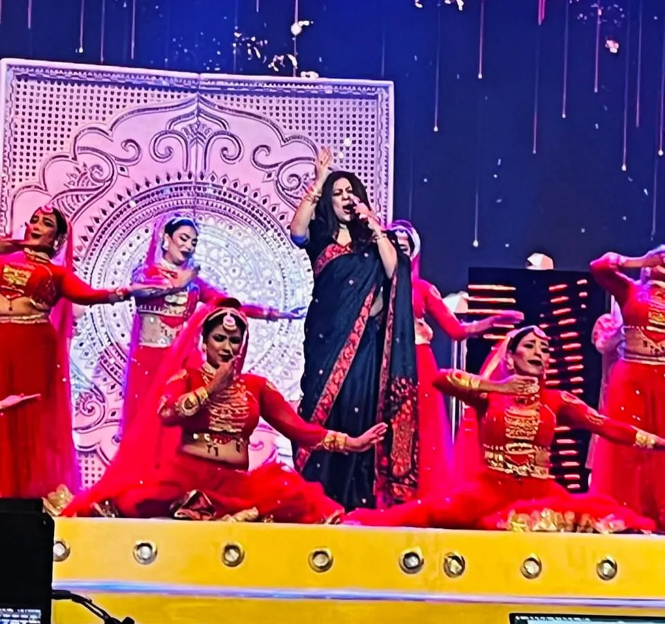 On stage is my happy space. Here I am, performing for the Stagecraft Awards, surrounded by the vibrant energy of dancers and a grand production.