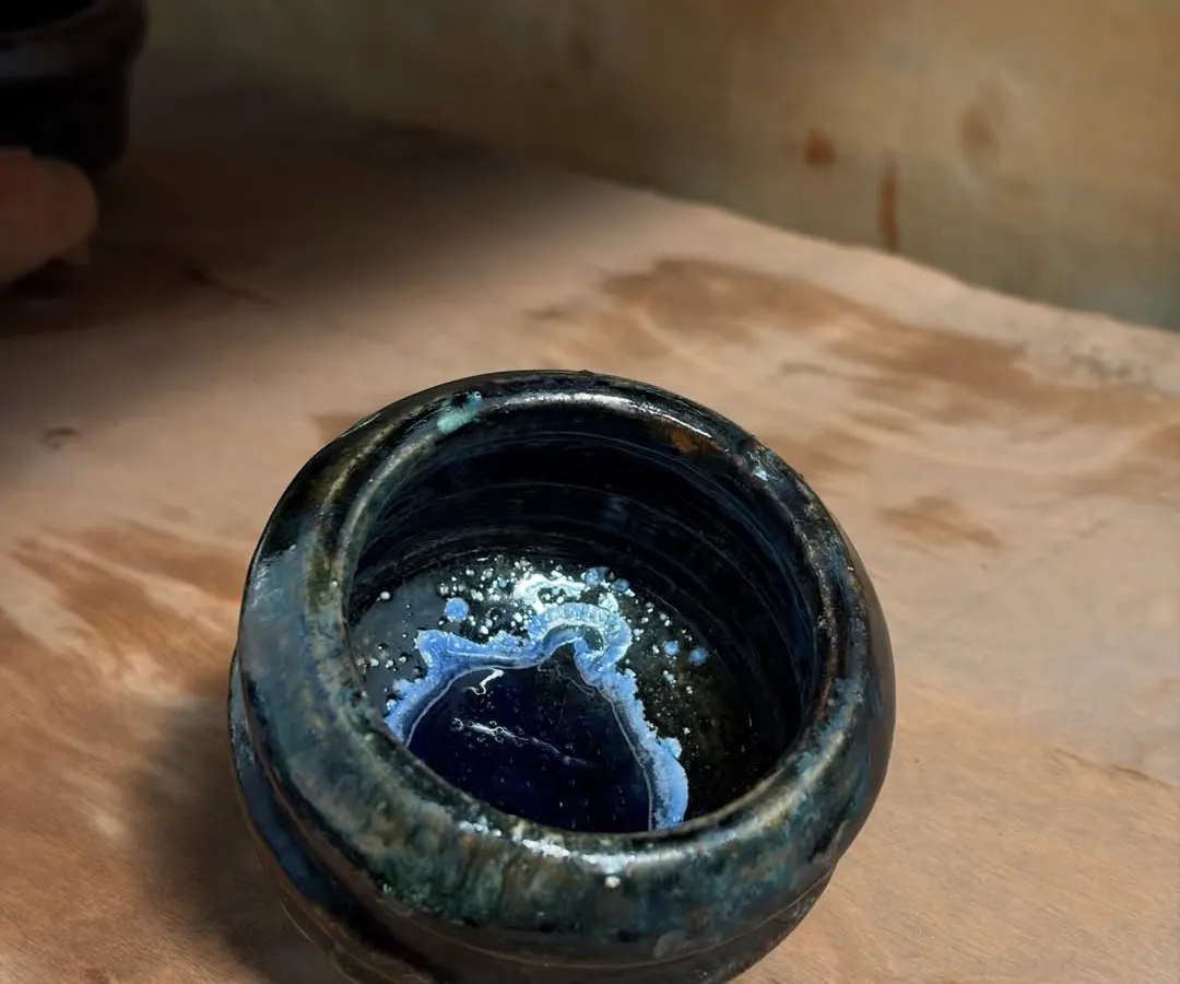 This handmade tea bowl shows the beautiful layers a glaze can build after being fired first in a gas kiln and then again in a wood firing. I call these my 'multi-purpose lovelies', perfect for your daily chai or snacks.