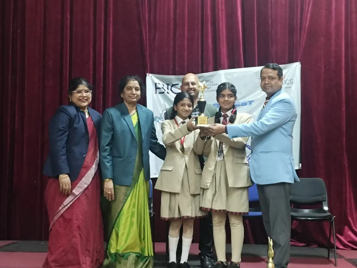 Our students receiving one of their four awards at the Robozest 2.0 inter-school competition. This victory in the senior category for their 'Blind Man Stick' project highlights our hands-on approach to robotics and problem-solving.