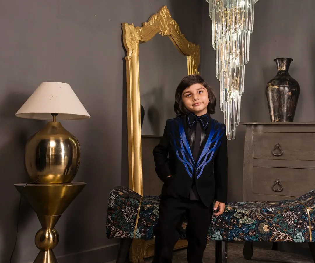 Here is a look at my custom wire detailed tuxedo. The jacket features striking blue satin piping on a black base, creating a modern and sharp silhouette for any formal occasion like a wedding or a milestone birthday party.