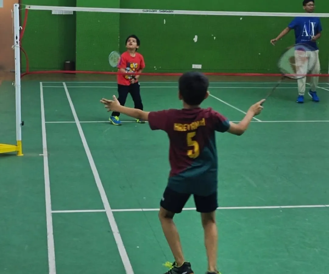 It's always a great day when the kids take over the court. Here you can see our junior players learning the game, full of excitement and ready to hit the shuttlecock. We provide a safe and fun space for children to develop their badminton skills and find their passion for the sport.