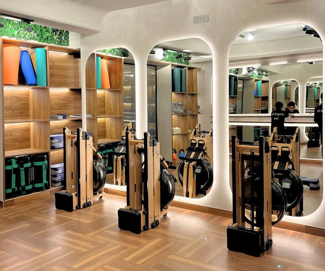 Welcome to your new sanctuary for strength. Our studio is equipped with beautiful wooden water rowers, set in a calming, modern space designed to help you disconnect from the outside world and connect with your movement.