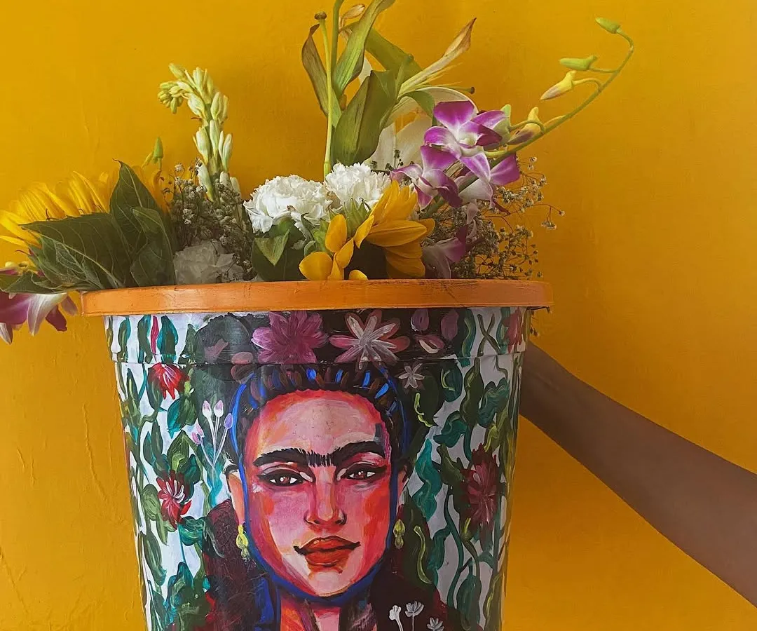 This Frida Kahlo planter is one of my favorite pieces. I used bold colors and intricate details to capture her spirit, turning a simple planter into a vibrant piece of home decor that really makes a statement.