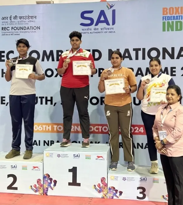 We produce champions. Here is our boxer Jagruti Both on the podium after winning a silver medal at the REC Combined National Talent Hunt Boxing Program in Rohtak, Haryana. This is the result of discipline and hard work.