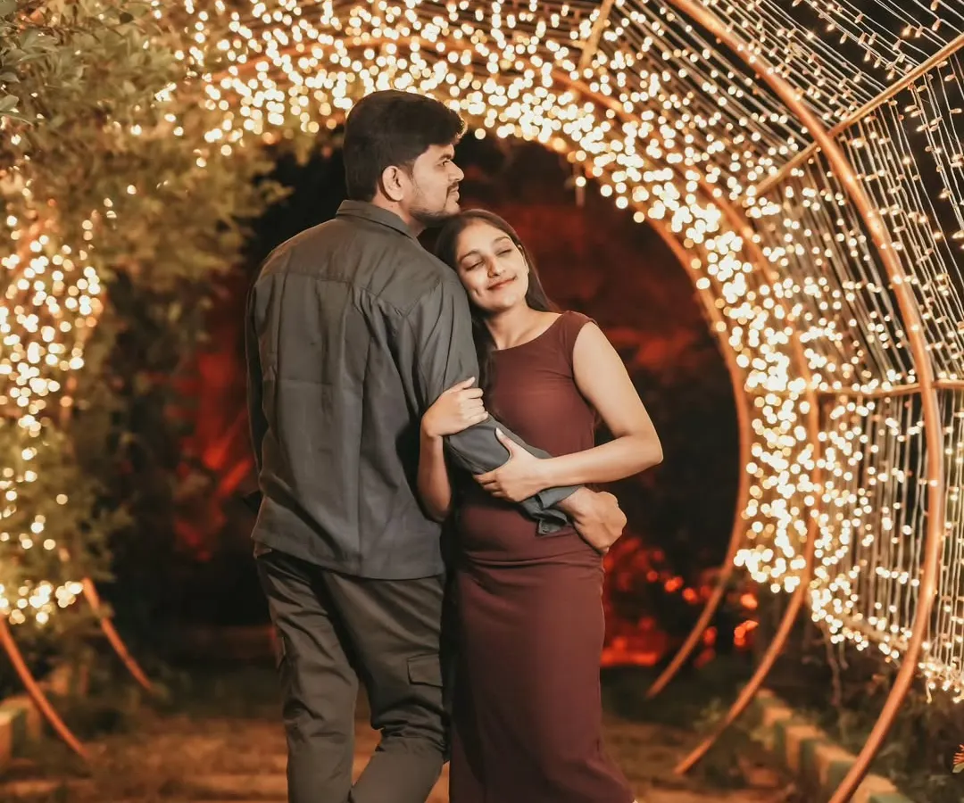 Creating magic in our fairy light tunnel. These night shoots are a favorite for couples who want dreamy, romantic pre-wedding photos.