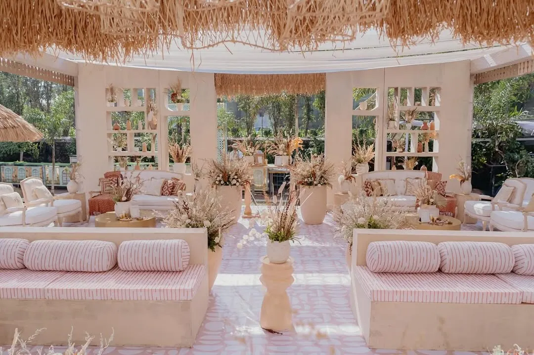 I transformed an open lawn into a complete 'Desert Oasis' for this unique Haldi ceremony. The setup featured custom-built structures, cohesive lounge seating with themed upholstery, and a color palette of earthy tones to create an immersive, elegant experience.