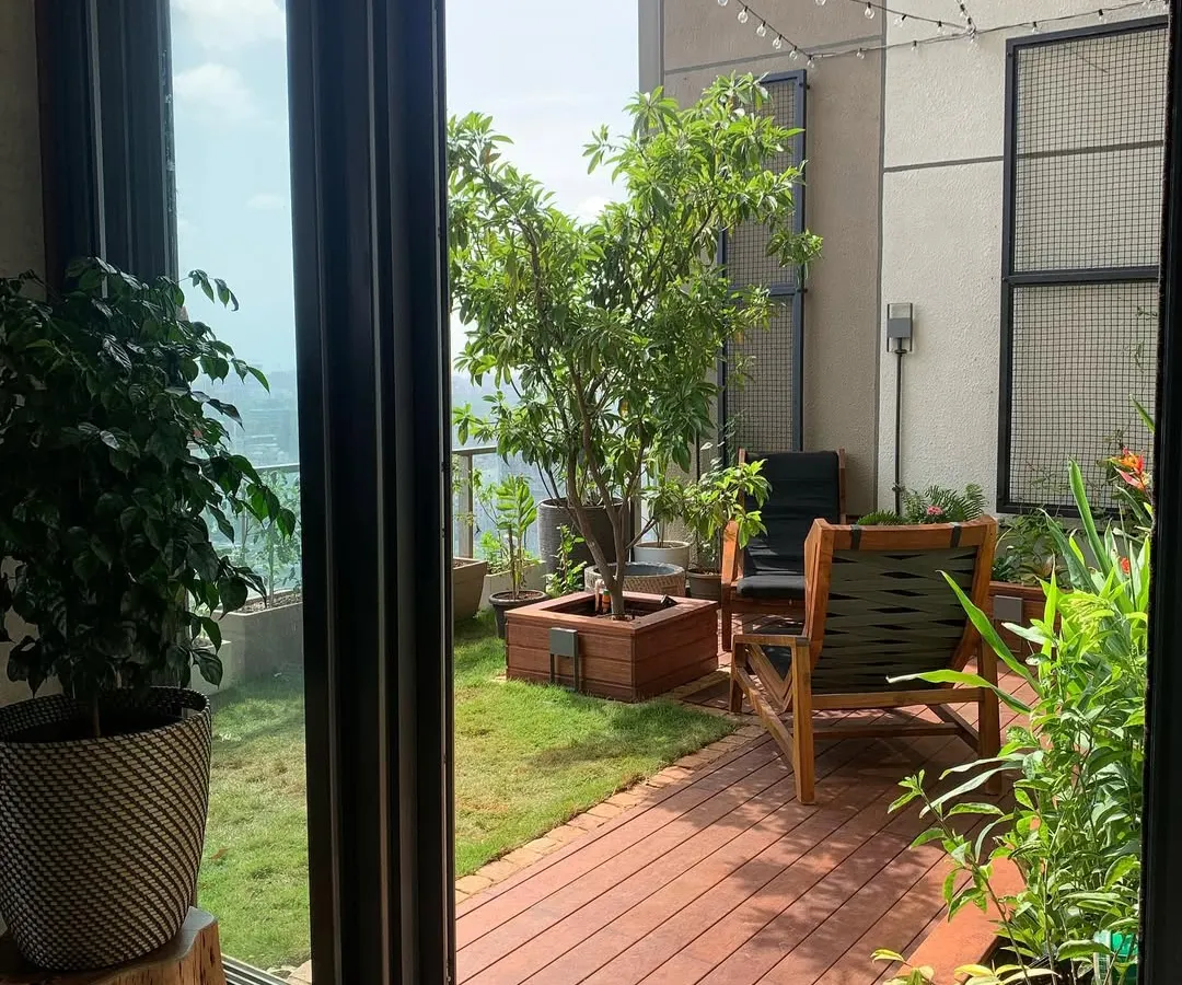 We can turn any terrace into a functional and beautiful outdoor living room. This project features a custom wooden deck, a lush lawn area, and carefully selected trees to create a private escape with a city view.