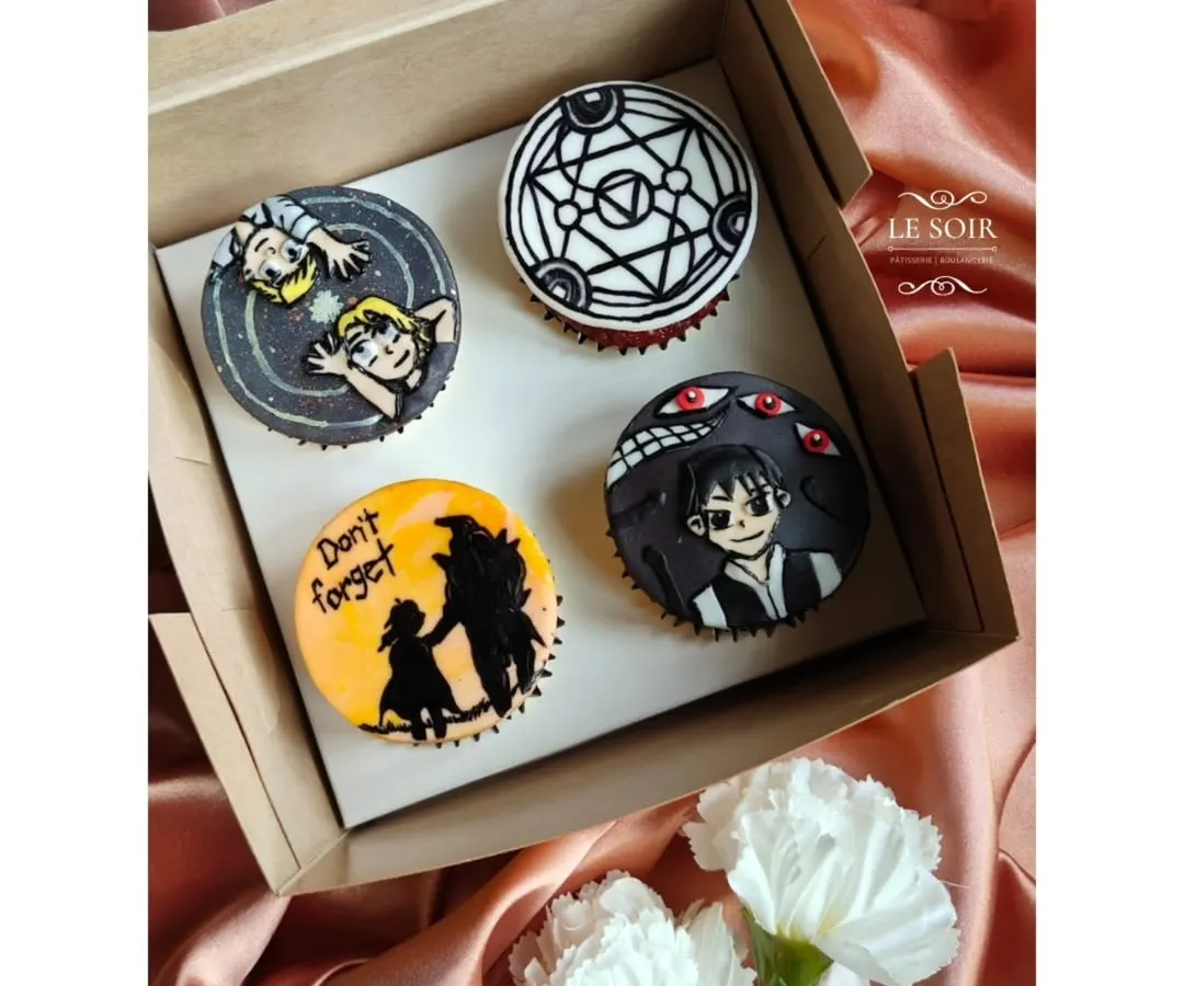As a huge anime fan myself, I had the best time making these Fullmetal Alchemist themed cupcakes. Each topper is a hand-crafted fondant piece, featuring iconic characters and symbols from the series. If you have a favorite show, I can bring it to life.