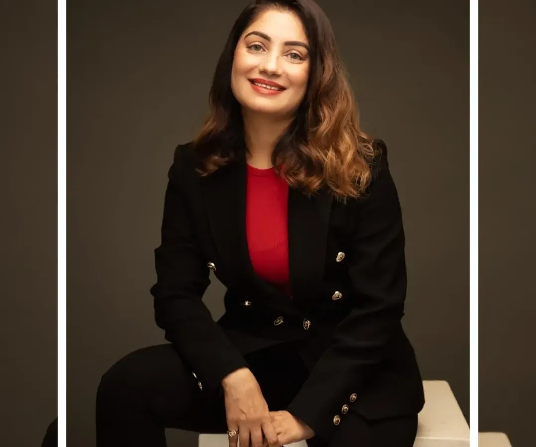 We explore different poses during a session to give you a variety of options. This seated business portrait creates a professional yet approachable look, ideal for personal branding and speaker profiles.