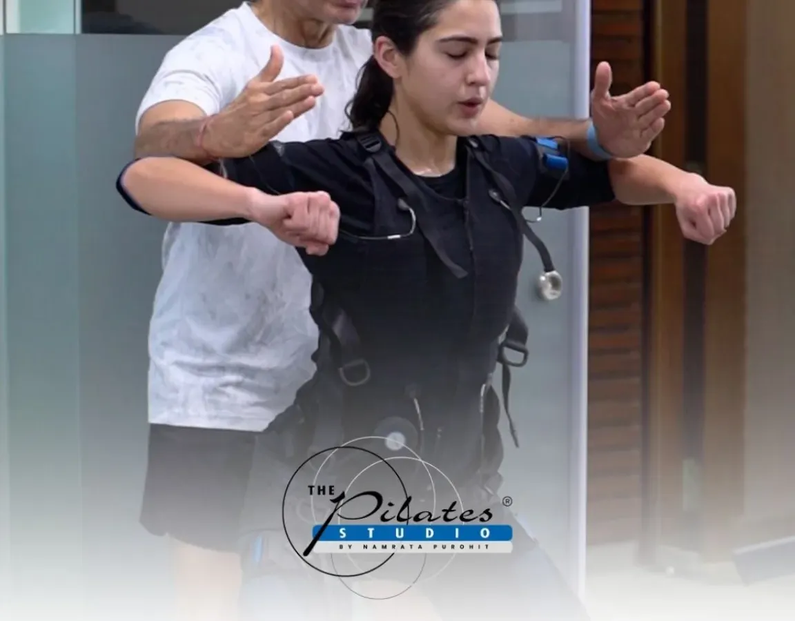 Here is Sara Ali Khan during an intense EMS session with our Master Trainer, Samir Purohit. In just 20 minutes, Electro Muscle Stimulation activates 90% of your muscles, delivering a full body workout that is both efficient and incredibly effective for building strength and tone.