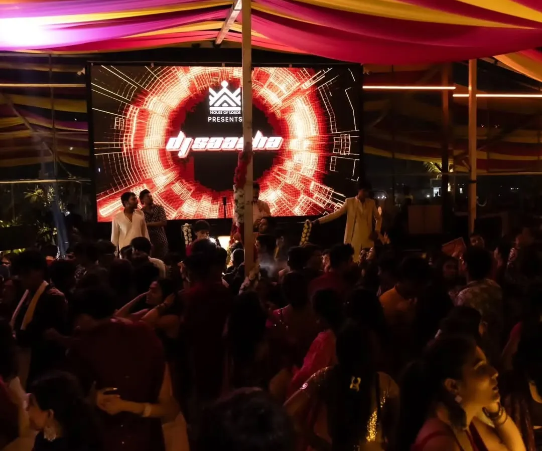 A packed dance floor is my promise. Here's a glimpse of a massive Sangeet night where the energy was electric from start to finish, complete with custom LED visuals.