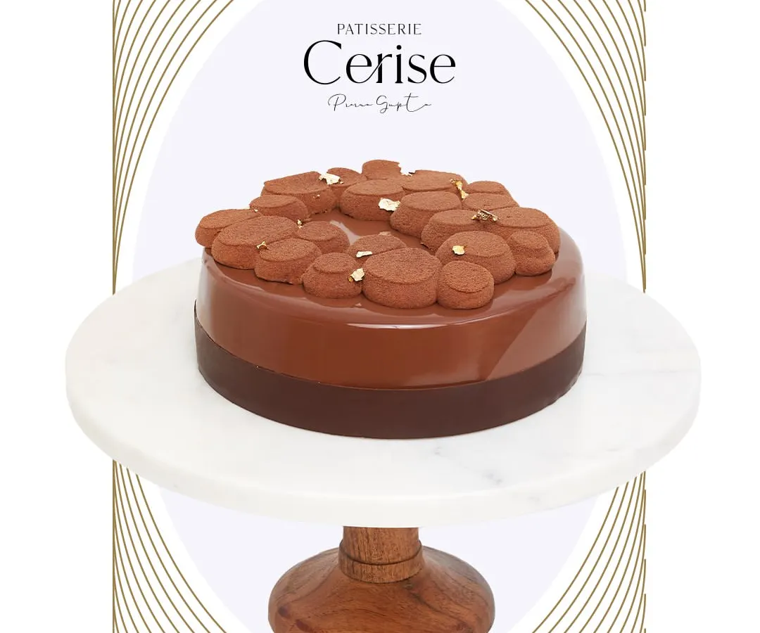 I call this one Midnight Sun. It is an unapologetically decadent composition of silky caramel and bold couverture chocolate. Each layer is designed to be a slow, intense, and deeply comforting experience.