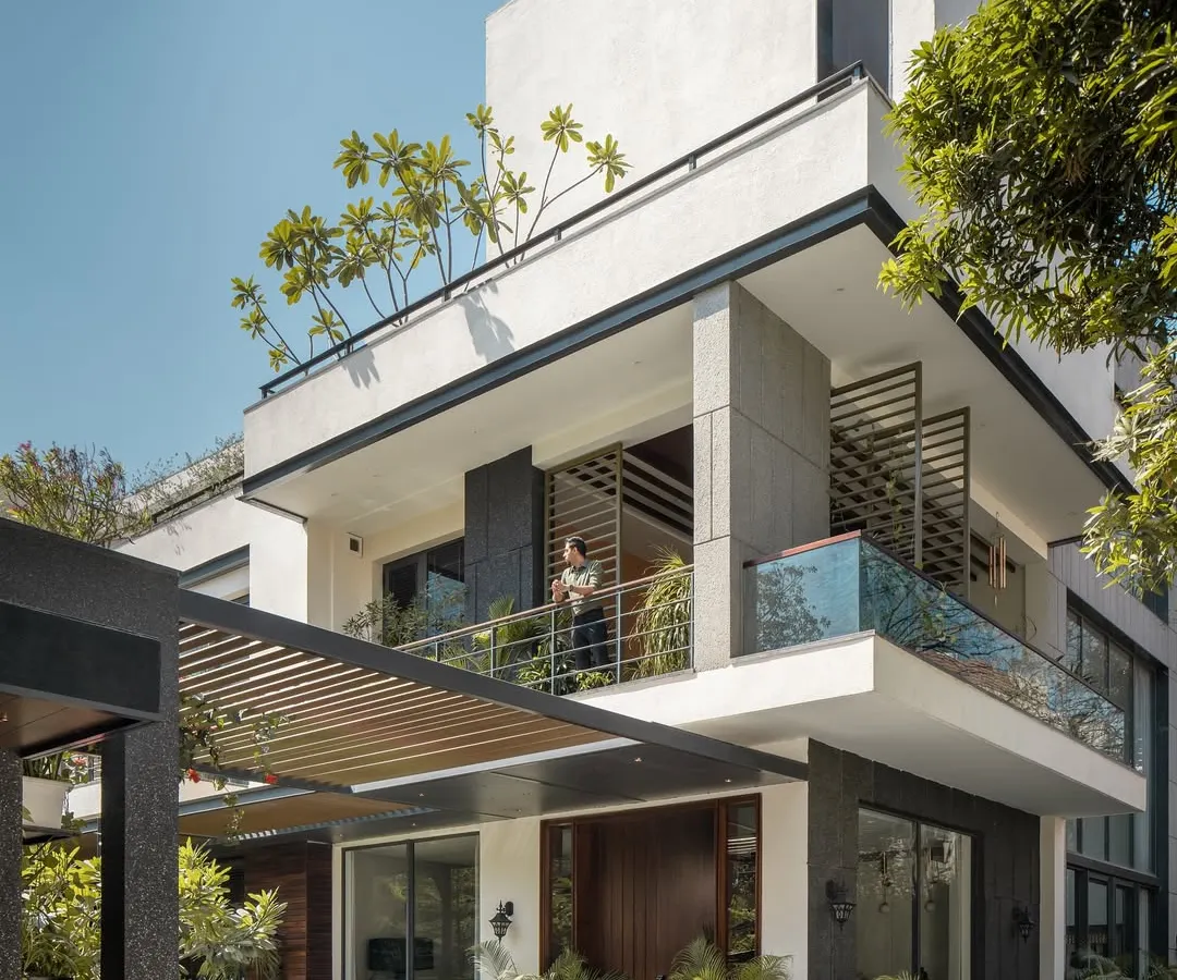 For Twin Villa, a home for two families, we designed a structure that balances privacy with connection. The architecture uses layered volumes, deep balconies, and integrated planters to create a modern residence that is softened by the landscape it inhabits.