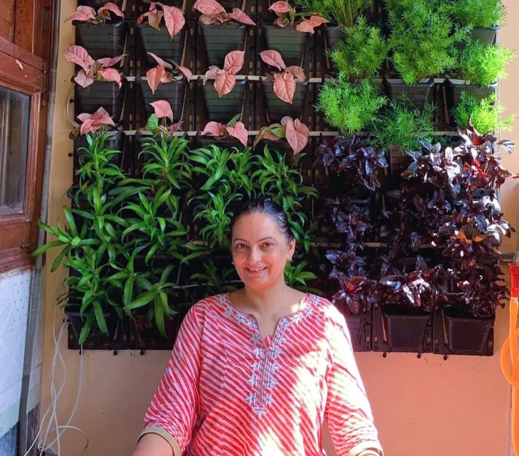 This is what it's all about: creating a peaceful corner for you to enjoy. I turned this small balcony into a serene spot for morning yoga or a quiet cup of tea, complete with a vibrant, living plant wall.
