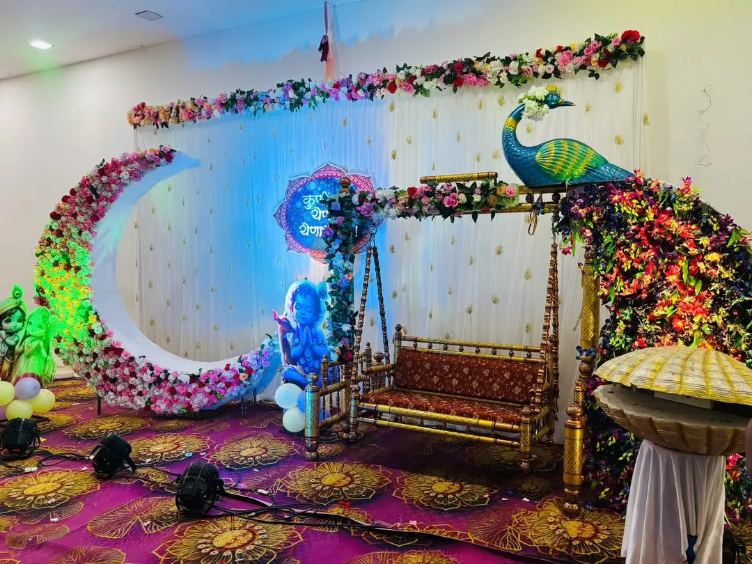 This baby shower was a dream to design. I created a large floral crescent moon as a photo corner and decorated the traditional swing (jhoola) with an elaborate peacock made entirely of fresh flowers and foliage.