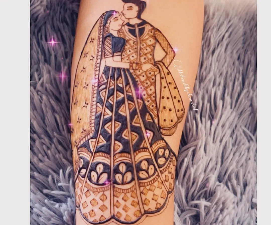 A beautiful bridal couple portrait on the forearm. I love capturing the love and connection between partners, creating a piece of art they can cherish for their special day.