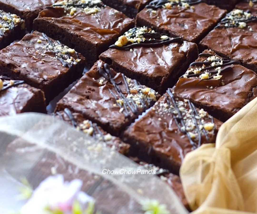 A batch of my classic fudgy brownies, ready to be packed. These are rich and sturdy, which is why they are a popular choice for sending as gifts, even to other cities.