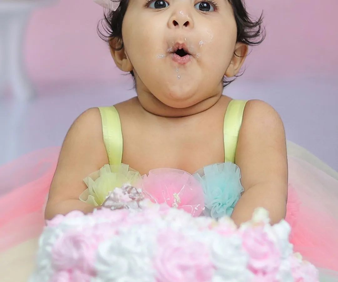 The pure surprise and joy of a first birthday cake smash. We capture these wonderfully messy and expressive moments in our fun, themed setups.