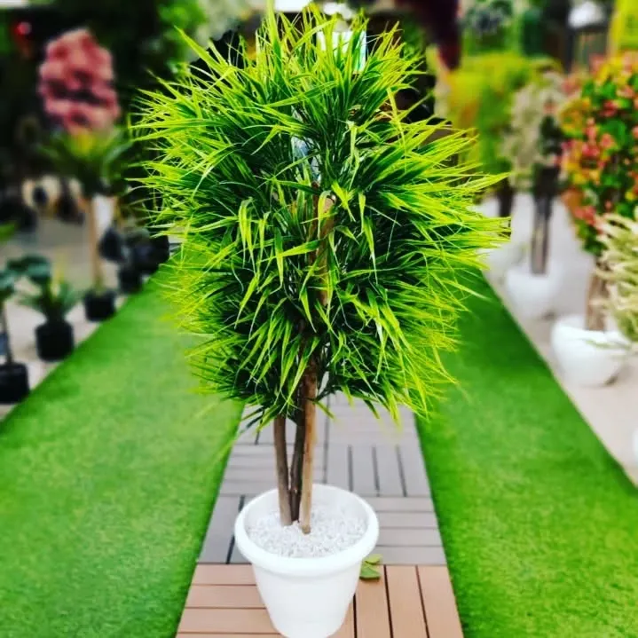 For those who want a green look without the work, I offer complete artificial landscaping solutions. This setup shows high-quality artificial grass with a clean walkway and a handmade artificial plant, perfect for balconies or office spaces where maintenance is difficult.