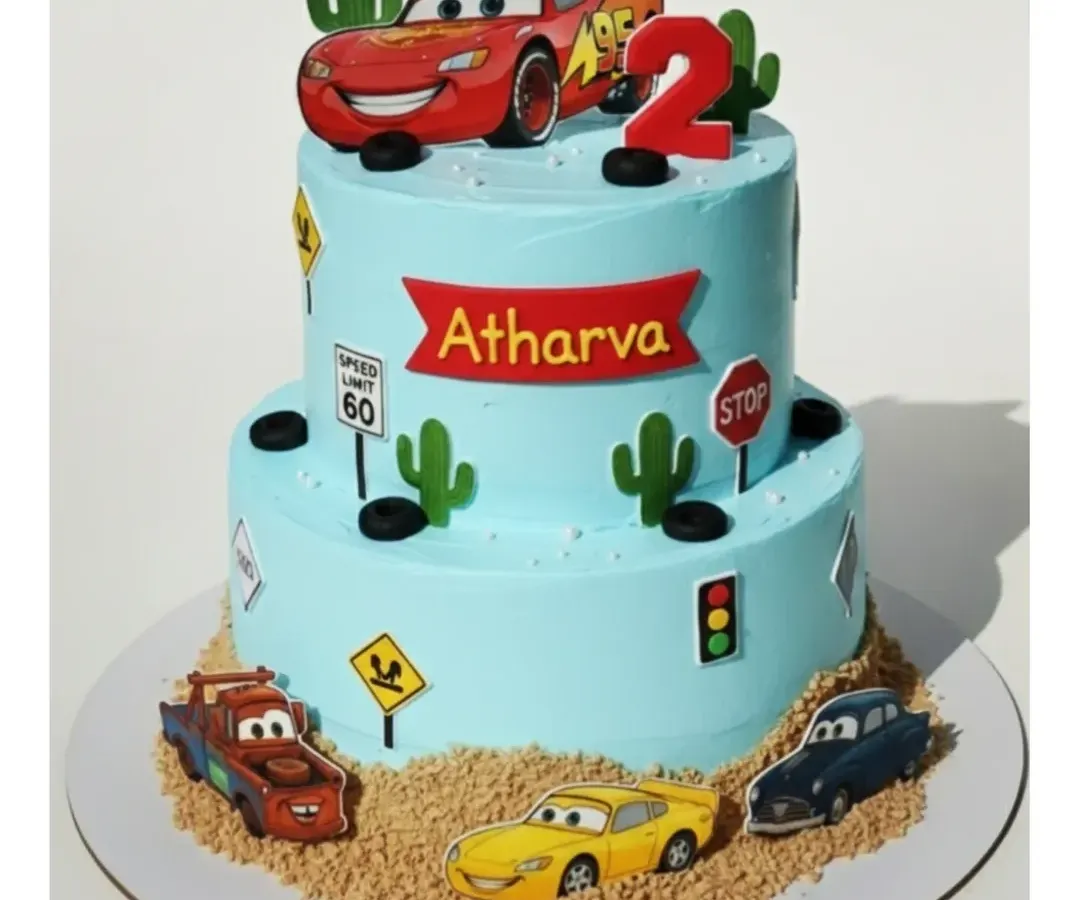 For this two-tier Cars themed cake, I combined a fresh pineapple flavor with detailed, fun decorations. It’s a great example of how I can build an exciting world around a popular character theme, all completely from scratch and without preservatives.