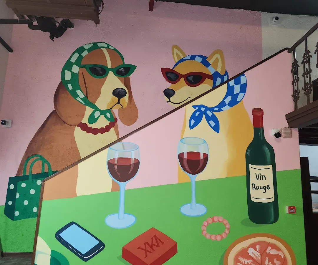 This quirky mural at a Gurgaon cafe brings a dose of fun and personality to the space. We specialize in creating custom characters and scenes that tell a story, making your establishment a memorable spot for customers.