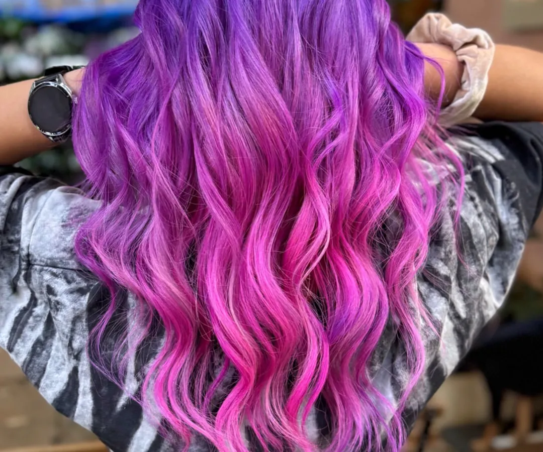 We're all about channeling that main character energy. This stunning purple to pink ombre melt was created using vivid hair colour for a look that's pure magic.