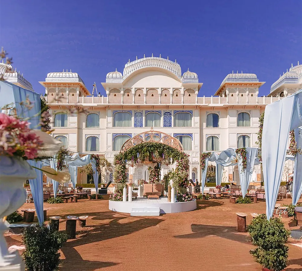 A destination wedding at a palace like The Leela in Jaipur is about making the venue itself a part of your story. Here, you can see the magnificent scale of a daytime ceremony I planned, with the stunning architecture providing a naturally royal backdrop. My job is to enhance this beauty with elegant decor that feels both grand and personal.