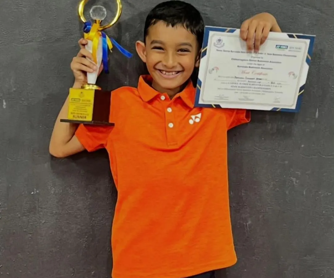 The result of hard work and dedication. We are proud to celebrate one of our young trainees, Pratham, after his victory at the Karnataka State Badminton Championship, holding his trophy and certificate.