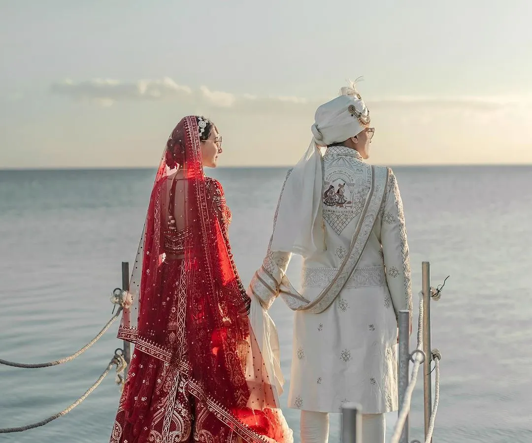 A quiet promise made against the endless horizon of Mauritius. My work often takes me to the world's most beautiful shores, where I capture love stories like this one at the Hilton Mauritius. This is for couples who dream of a destination wedding, blending the serenity of nature with the sanctity of their vows.