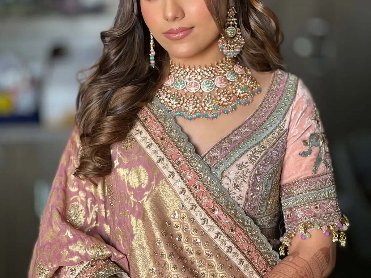A classic half-up style with soft, flowing waves is one of my most requested looks. It’s timeless, romantic, and perfect for any wedding event, from the engagement to the reception.