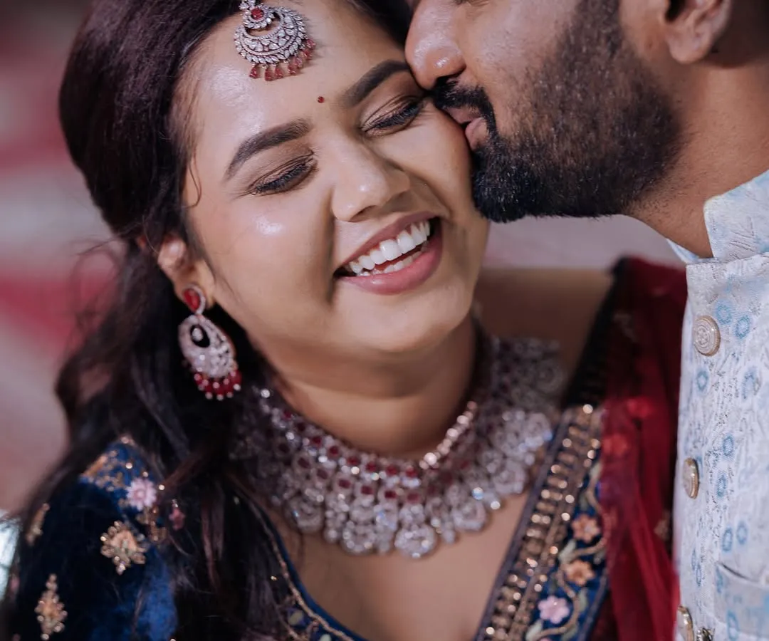 It's these unscripted, happy moments during the reception that I love to freeze in time. This close up shot captures the genuine connection and laughter between the couple.