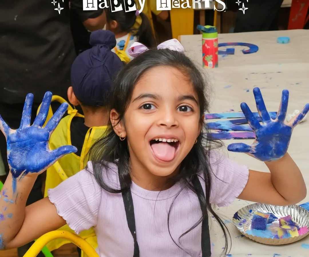 This is what it's all about: messy hands and happy hearts! I love seeing the pure joy on a child's face as they dive into the world of color and creation.